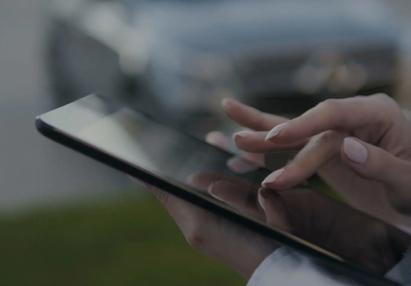 Download Key Benefits 3 A pair of hands are interacting and holding a tablet.